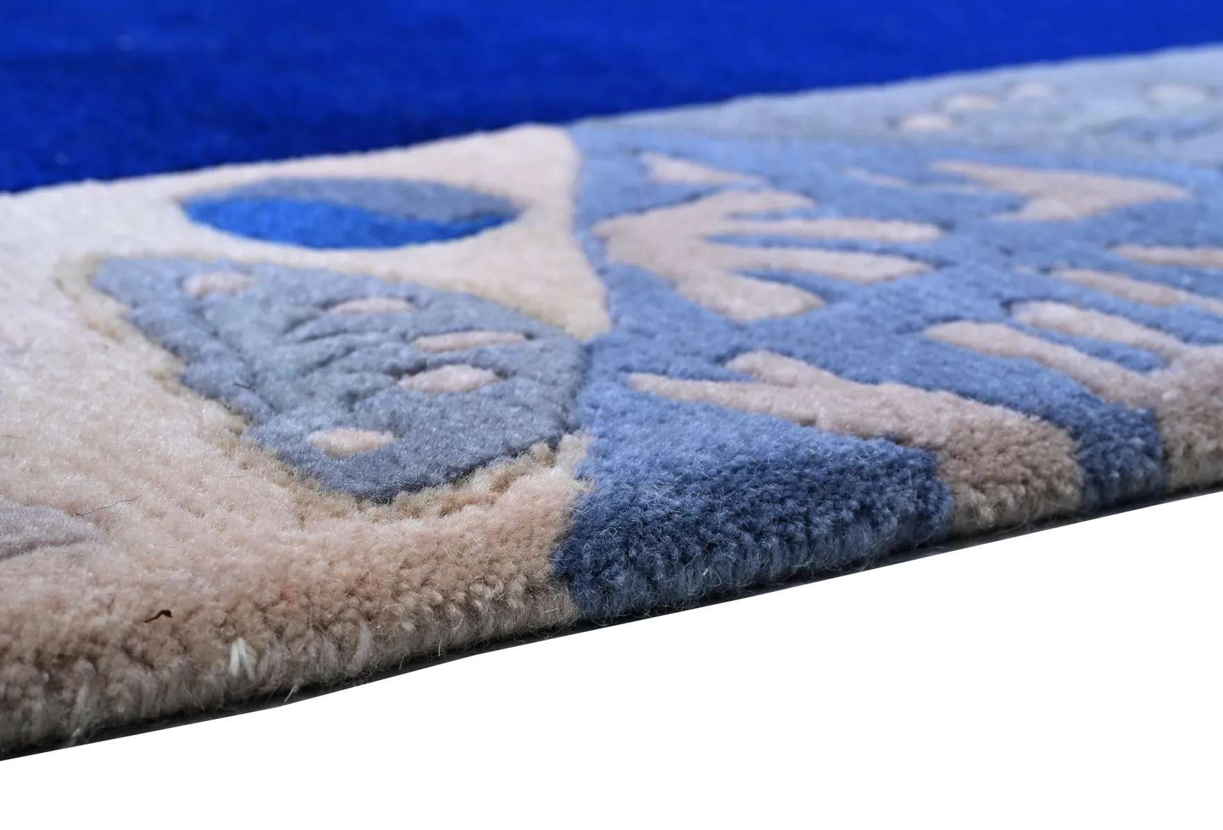 Handgeknüpfter Tibeter Teppich in blau mit Retro-Bordüre – Neuwertig