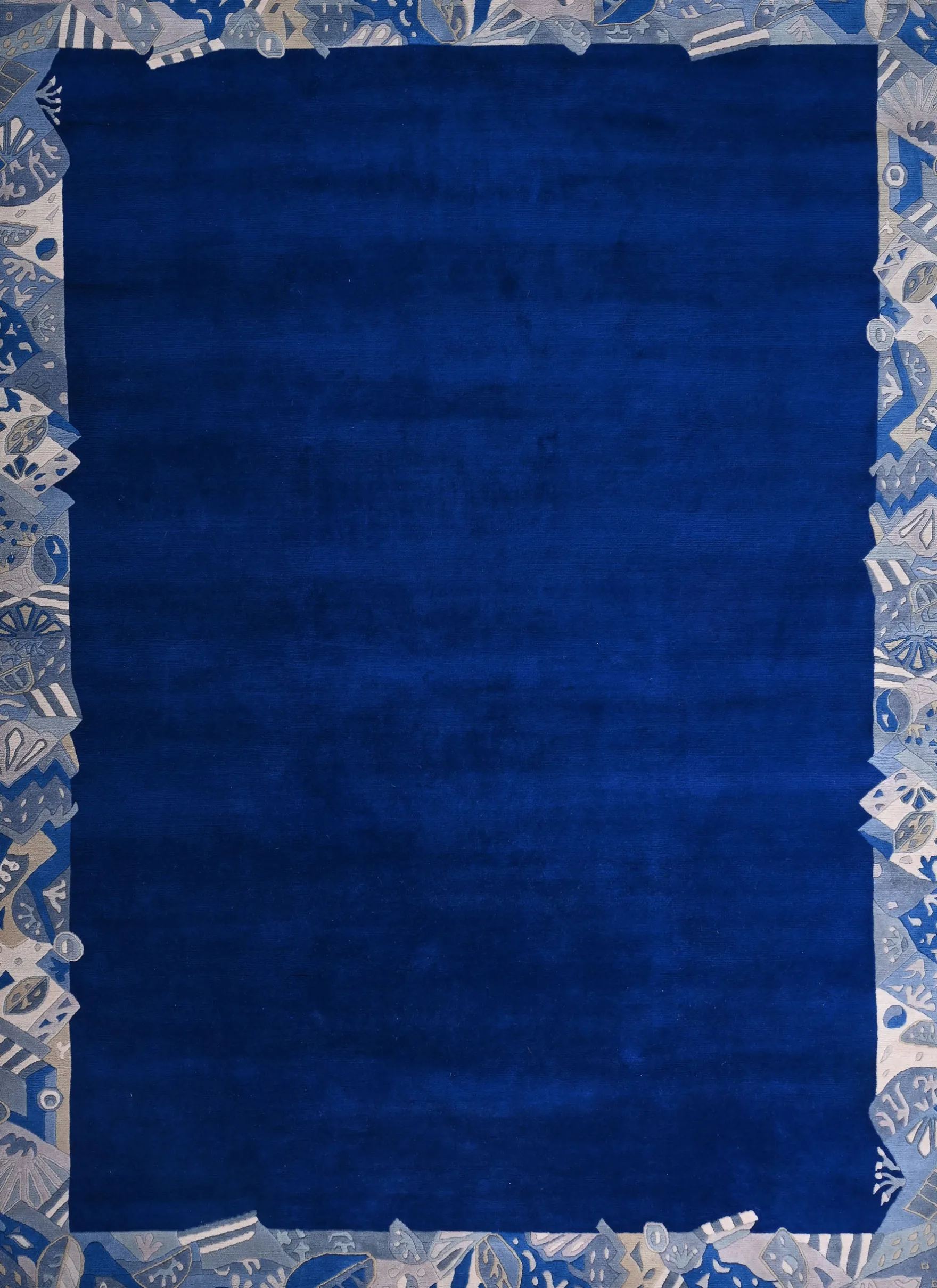 Handgeknüpfter Tibeter Teppich in blau mit Retro-Bordüre – Neuwertig