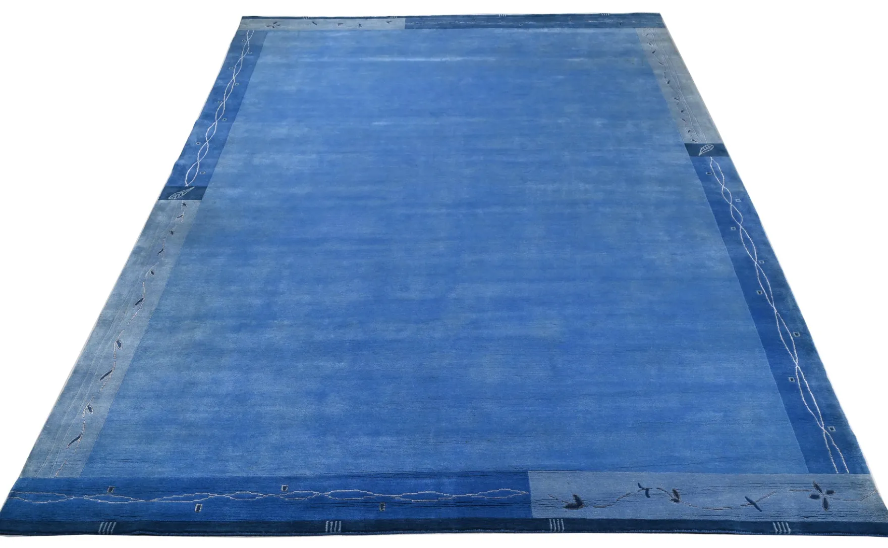 Handgeknüpfter tibetischer Teppich in blau mit Retro Bordüre – Neuwertig