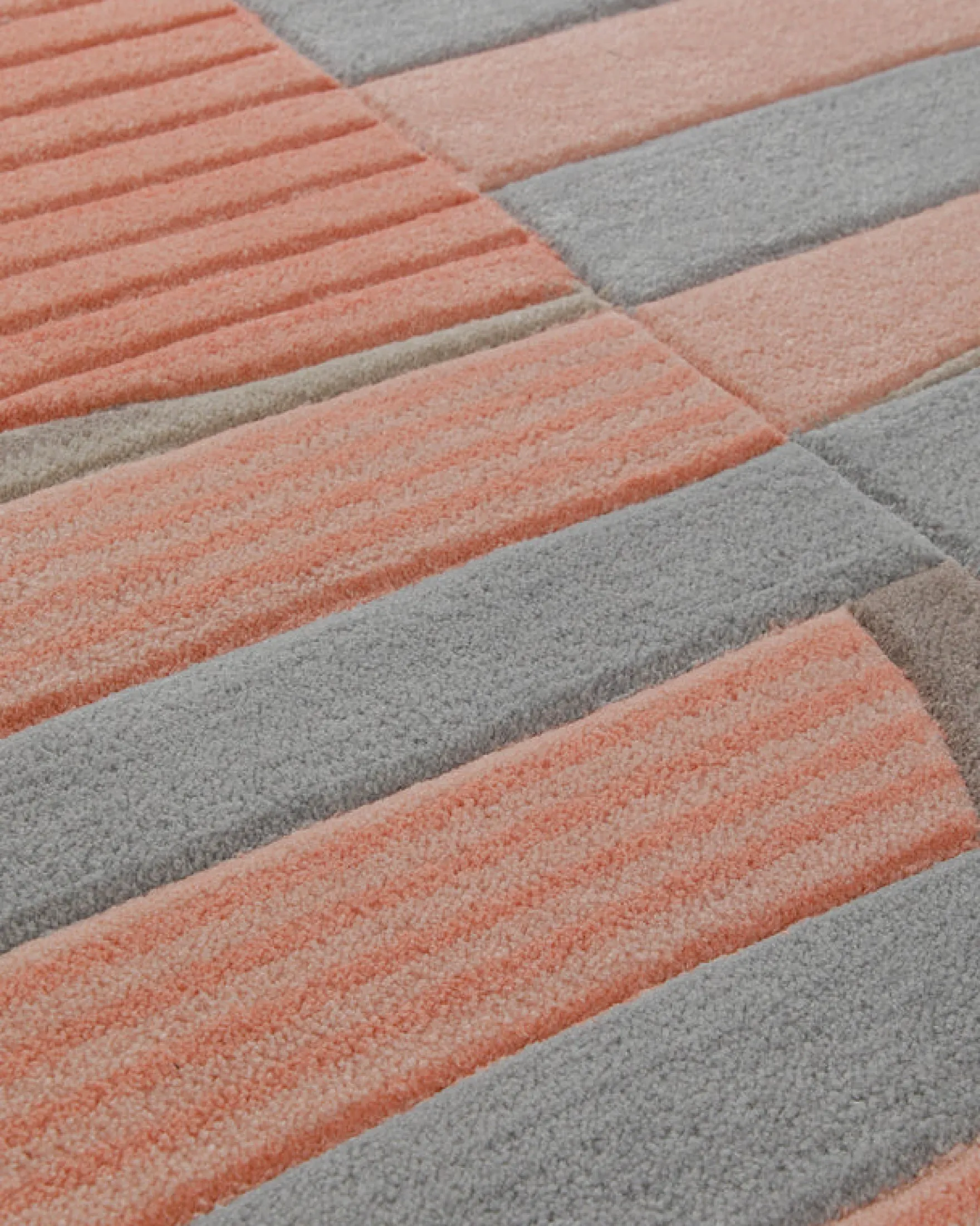 Kreissegmente in Koralle - Handtuft mit Rippenrelief 160 x 230 cm
