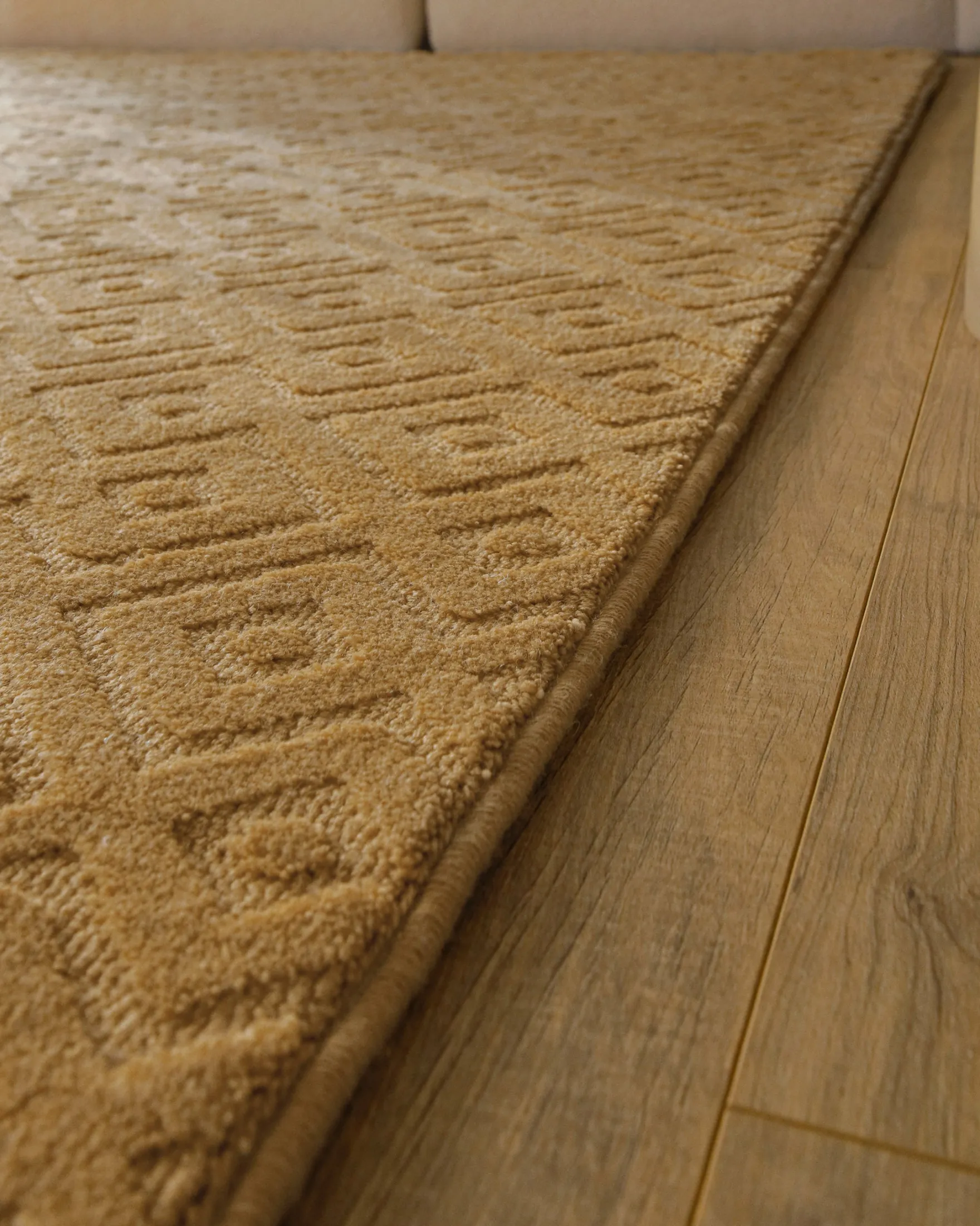 Kurzflor Teppich aus Schurwolle Karamell "Castello TWO" WECONhome