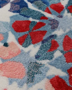 Mosaikblüte in Hellblau - Handtuft Wolle 160 x 230 cm